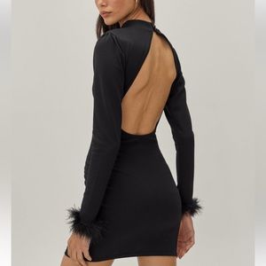 NastyGal black backless feather trim dress. Size US 4.
